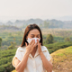 Asian woman wearing respiratory protection mask against air pollution and pm 2.5 dust particles - PhotoDune Item for Sale