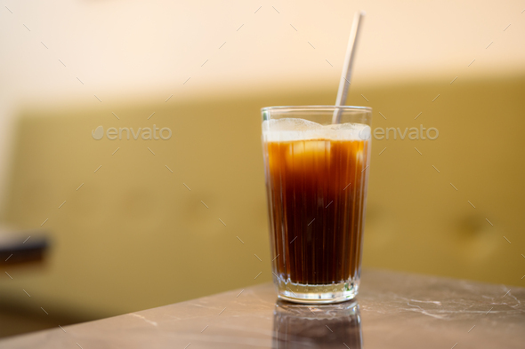Refreshing iced coffee on a table - Stock Photo - Images
