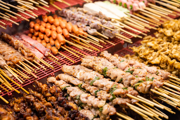 Grilled Skewered meat at street market - Stock Photo - Images