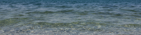 Universal banner 4x1 for websites, social network typography Transparent water surface near seashore