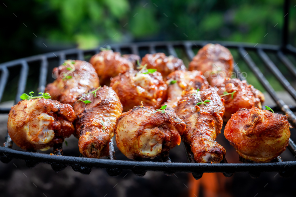 Hot grilled chicken leg marinated with honey and spices. - Stock Photo - Images