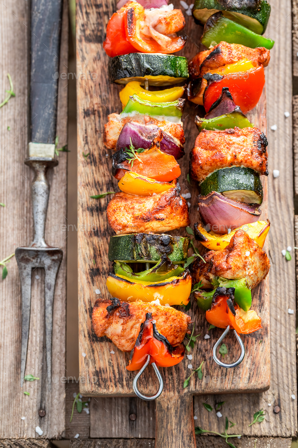 Spicy and fresh grilled skewers made of vegetables and meat. - Stock Photo - Images