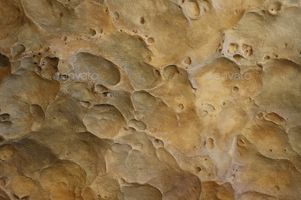 Combination of stone relief like a orange planet surface. Brown stone with abnormal relief shape - Stock Photo - Images