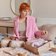 Elegant female customer opens parcel cardboard holds invoice paper unpacks carton package ordered - PhotoDune Item for Sale