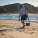 Man walking with his fishing rod along coast - PhotoDune Item for Sale