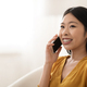 Happy beautiful asian woman having phone conversation at home, closeup - PhotoDune Item for Sale