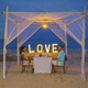 Romantic dinner on the beach in Phuket Thailand, couple man and woman having dinner on the beach - PhotoDune Item for Sale