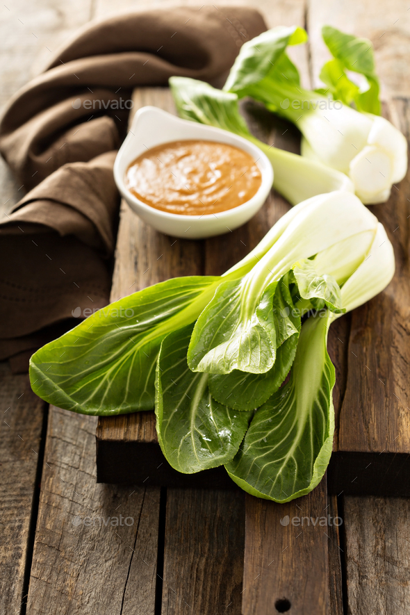 Baby bok choy with peanut sauce Stock Photo by fahrwasser PhotoDune