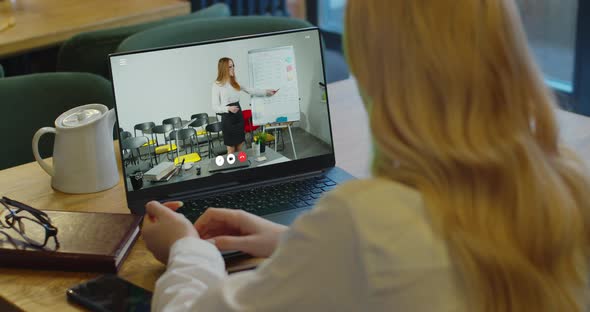 Woman Studying at Home Office Online By Conference Video Call Laptop Speak Communicates Teacher alt