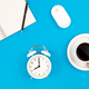 Alarm clock and coffee on blue background, work concept, flat lay. - PhotoDune Item for Sale