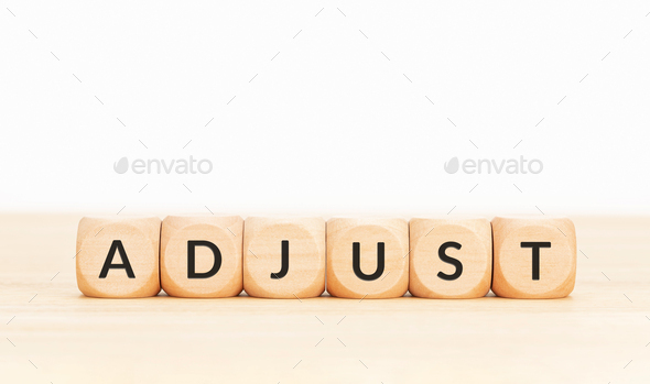 Adjust word on wooden blocks - Stock Photo - Images