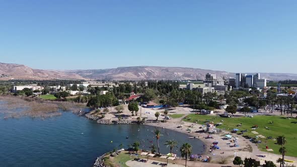 Aerial drone over the shores of the Sea of Galilee on a summer day