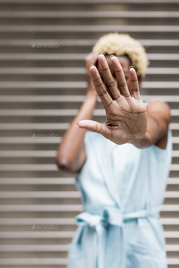 USA, New York, young blonde african-american woman, obscured face