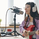 Singer recording her song in studio - PhotoDune Item for Sale