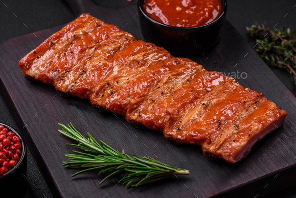 Delicious fresh grilled or smoked ribs with salt, spices and herbs ...