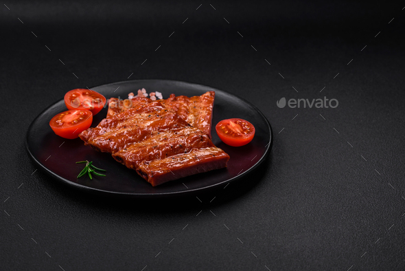Delicious fresh grilled or smoked ribs with salt, spices and herbs ...