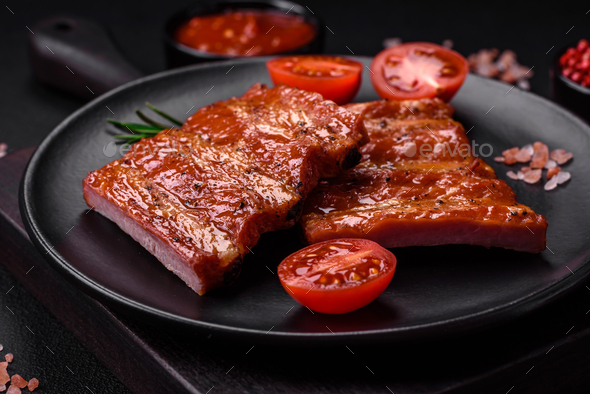 Delicious fresh grilled or smoked ribs with salt, spices and herbs ...