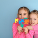 Children hold an autism symbol of support for special people with disabilities - PhotoDune Item for Sale