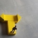 Miniature man standing at a turning point. Copy space for text. - PhotoDune Item for Sale