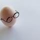 White shell egg wear glasses on white background - PhotoDune Item for Sale