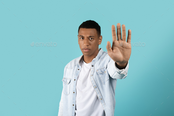 man hand stop sign Stock Photo
