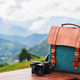 Travel backpack and camera with beautiful landscape view of mountain in the morning - PhotoDune Item for Sale