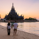 Sanctuary of Truth, Pattaya, Thailand, wooden temple by the ocean at sunset on the beach of Pattaya - PhotoDune Item for Sale