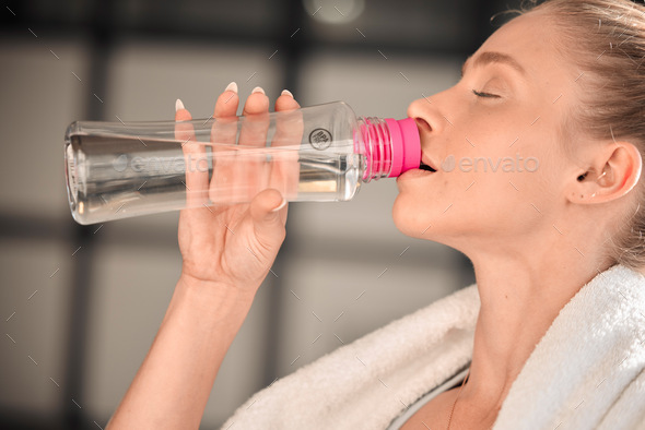 Fitness, athlete and woman drinking water in gym after workout, training or exercise. Sports, nutri - Stock Photo - Images