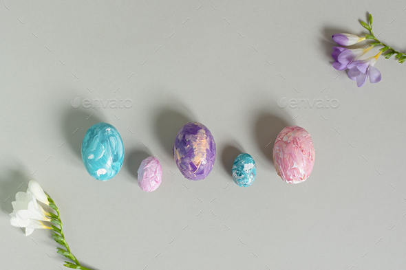 Happy Easter. Easter multicolored eggs on a light gray background. - Stock Photo - Images