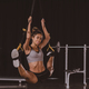 happy african american sportswoman stretching on suspension straps at gym - PhotoDune Item for Sale