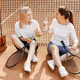 Female friends having a rest after tennis game - PhotoDune Item for Sale