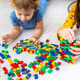 The child plays as a constructor. Selective focus. - PhotoDune Item for Sale