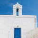 Cyclades, Greece. Small white church and belfry against blue sky, sunny day - PhotoDune Item for Sale