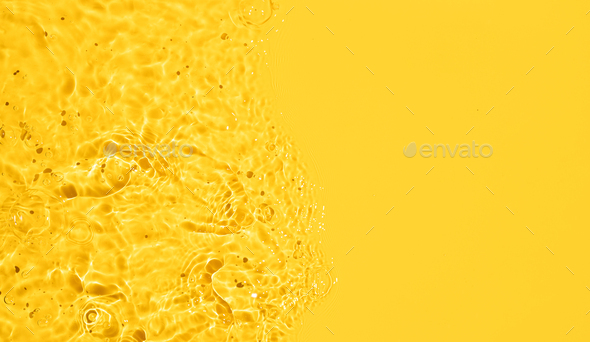 Yellow Abstract water background texture with ripples and waves - Stock Photo - Images