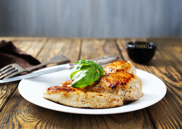 Marinated grilled healthy chicken breasts cooked  - Stock Photo - Images