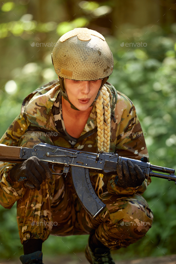 Military Lady Woman in Tactical Gear Posing for Photo in Forest