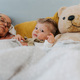 Grandmother lying with her grandson in the bed. - PhotoDune Item for Sale