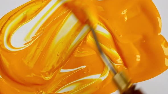 Artist Mixing Ingredients Watercolor Using Palette Knife and Pigments on White Background alt