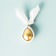 Stylish Easter flat lay with golden egg - PhotoDune Item for Sale