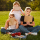 Kids sitting and reading literature. Boy and girls learning or studying. Pupils holding textbooks - PhotoDune Item for Sale