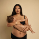 Portrait of Asian woman in underwear carrying a toddler - PhotoDune Item for Sale