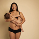 Portrait of Asian woman in underwear holding a toddler - PhotoDune Item for Sale