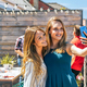 Two female friends taking a selfie in office rooftop on a summer day - PhotoDune Item for Sale