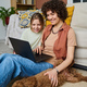 Family with dog using laptop - PhotoDune Item for Sale