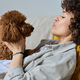 Woman hugging and loving her dog - PhotoDune Item for Sale
