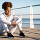 Portrait Of Beautiful Black Woman In Sportswear Relaxing After Training Outdoors - PhotoDune Item for Sale