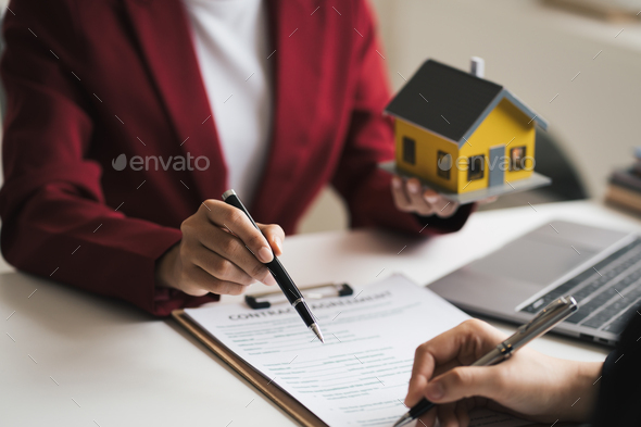 Real estate inheritance concept and contract agreement. The customer makes a rental contract with th