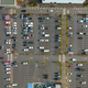 Aerial view of many colorful cars parked on parking lot with lines and markings - PhotoDune Item for Sale