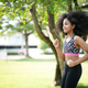 Portrait of Mixed Race girl jogging in the park. - PhotoDune Item for Sale
