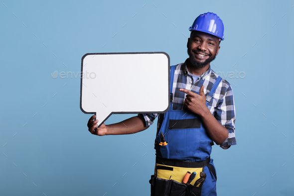 Man pointing to empty white dialogue bubble